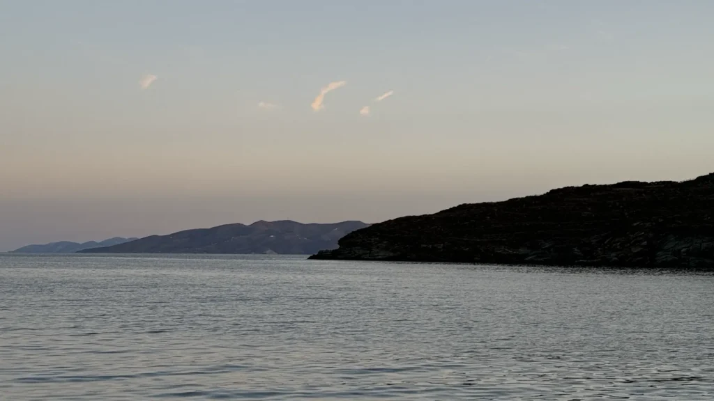 Skylou, Kythnos: the beach you have to carry everything to Calm evening sea and hills seen from Skylou beach, Kythnos, in September